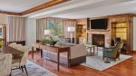 Living room with gas fireplace and hardwood floors
